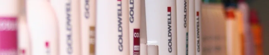 Shelf of professional Goldwell hair care products